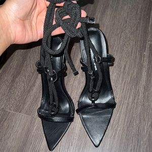 Black heels , new never used . They wrap up super cute